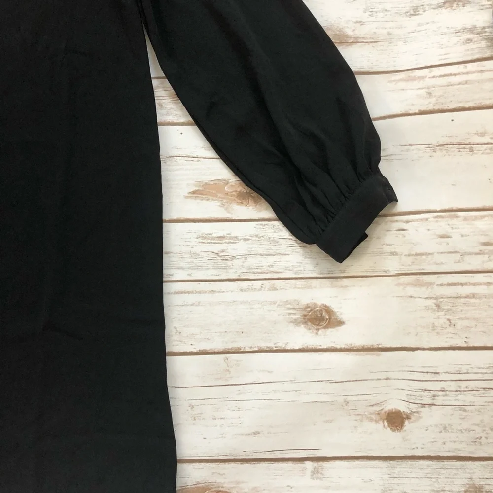 Reyna Couture black blousant sleeve dress